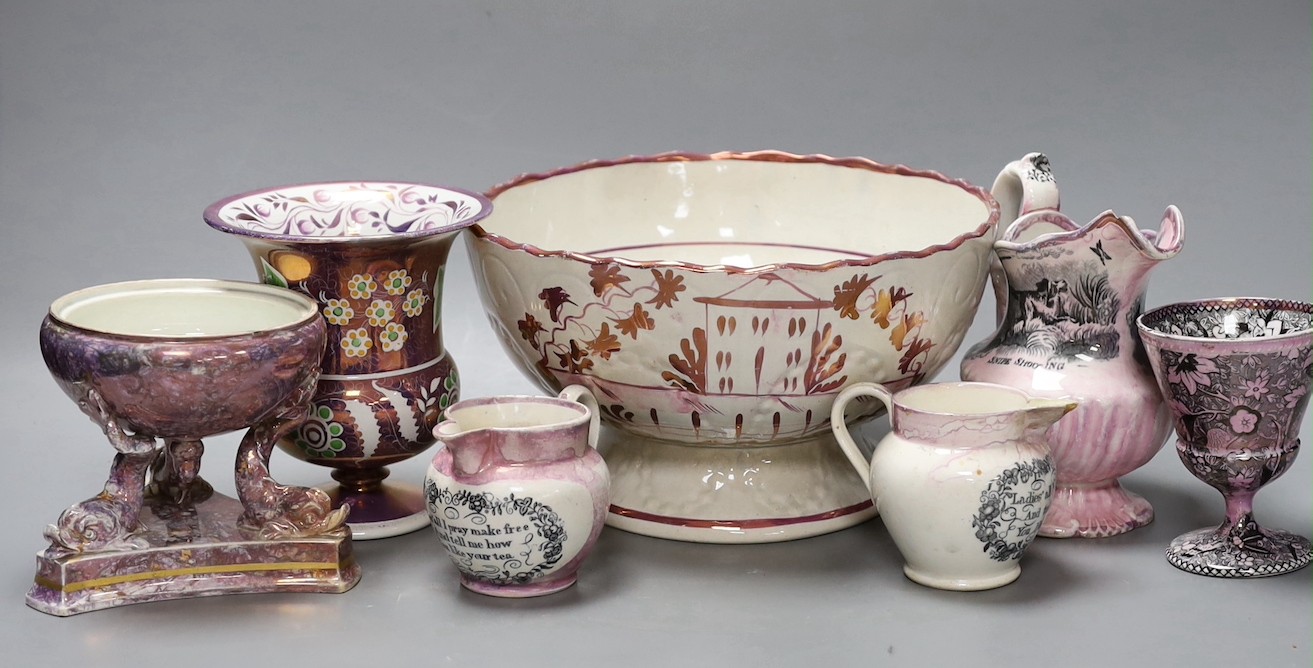 A group of early 19th century pink lustre vases and jugs and a junket bowl